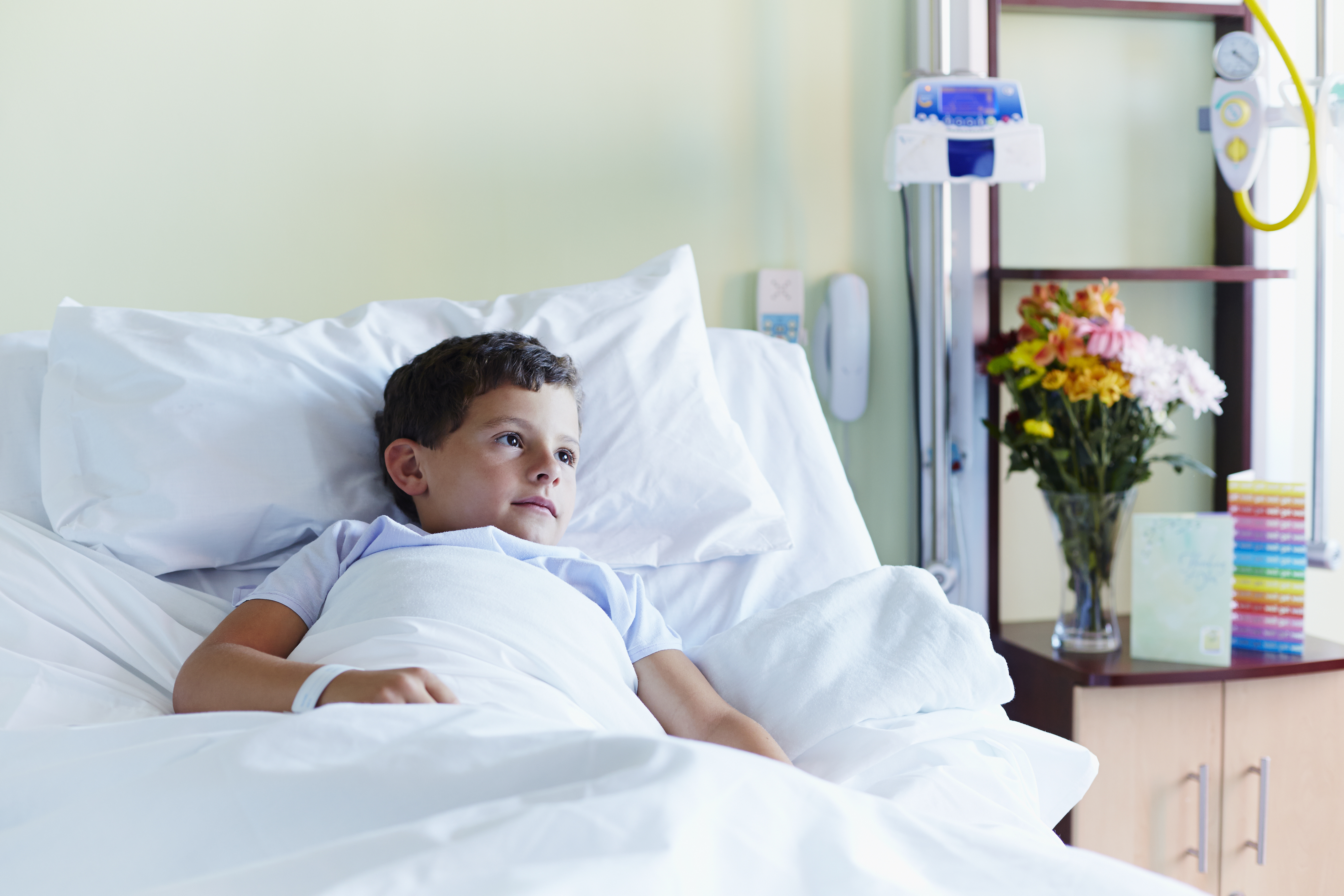 Child In Hospital Bed